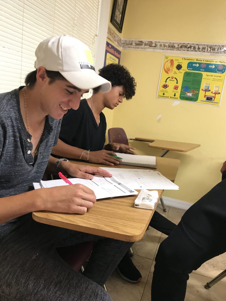 Santiago Diaz and Jordan Hunte, rising seniors at ESIS, study in preparation for a test. They were among 66% of the students at ESIS who took Advanced Placement exams this year.